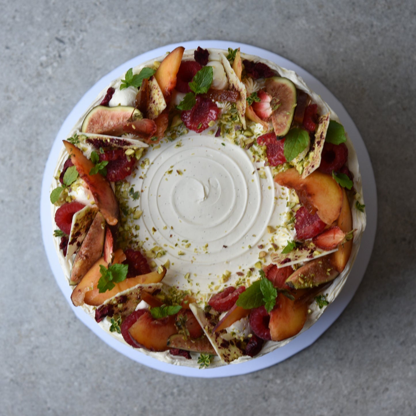 Seasonal august peach melba cake